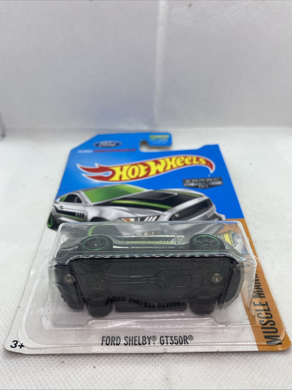 Hot Wheels Ford Shelby GT350R die-cast in clear blister on blue card with green rims