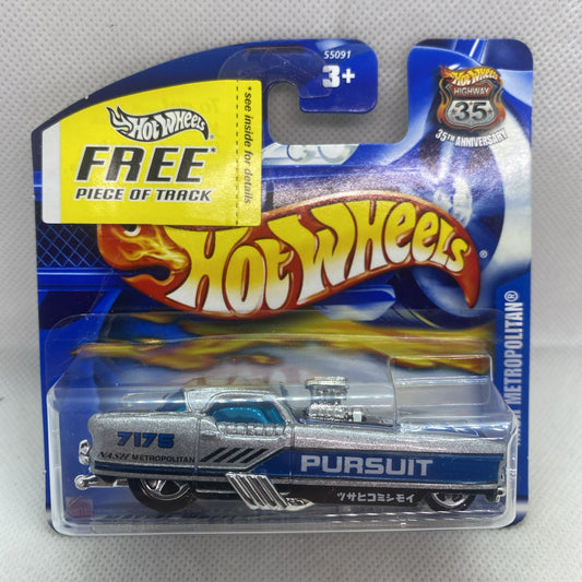 Hot Wheels die-cast car in blister, silver “Pursuit” side view