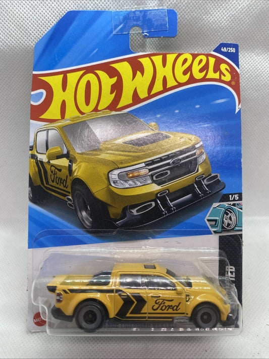 Hot Wheels '22 Ford Maverick Custom toy car in yellow blister package, front view