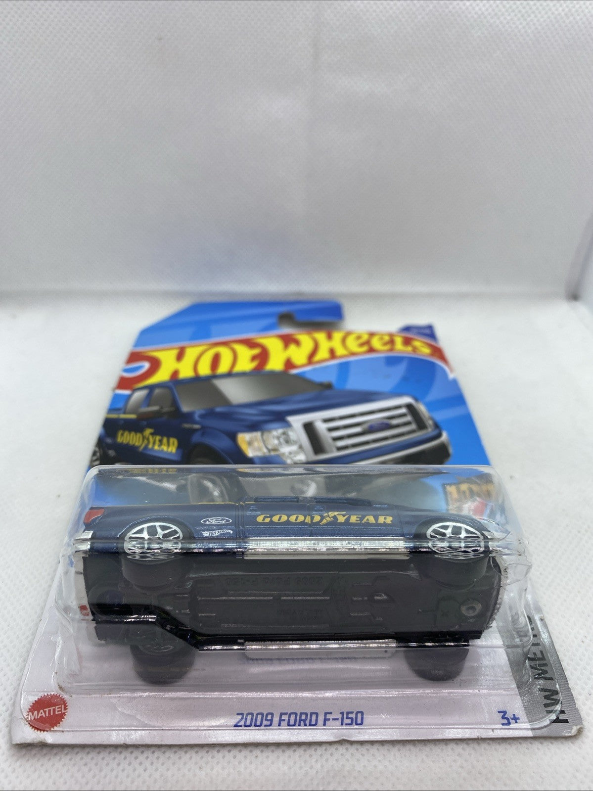 Hot Wheels HW Metro 2009 Ford F-150 die-cast truck on card with clear blister