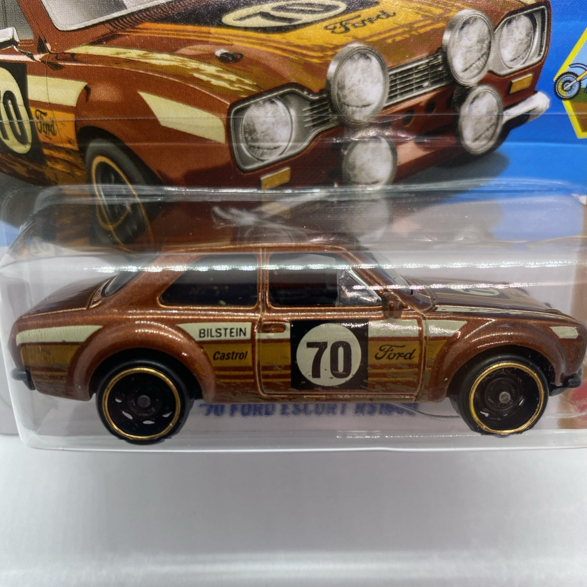 Hot Wheels 1:64 die-cast car in blister, close-up of brown front grille and headlights