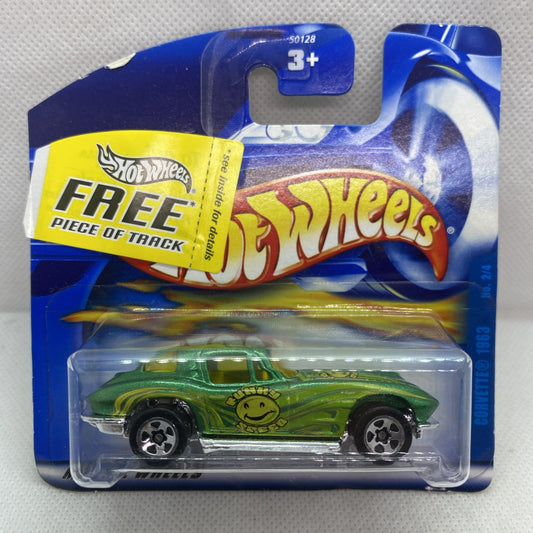 Sealed Hot Wheels green die-cast car in clear blister on blue card