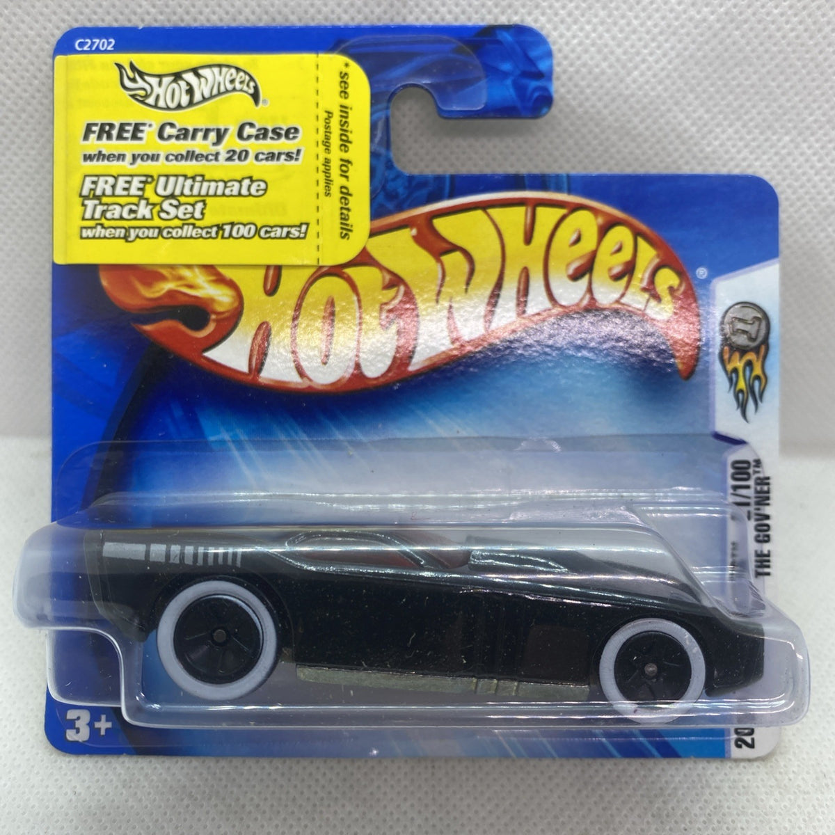 Hot Wheels die-cast car in clear blister with blue card, black body and silver details